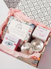 Silverette Nurturing Essentials Bundle with silver nursing cups, cream, and storage case for breastfeeding comfort and care